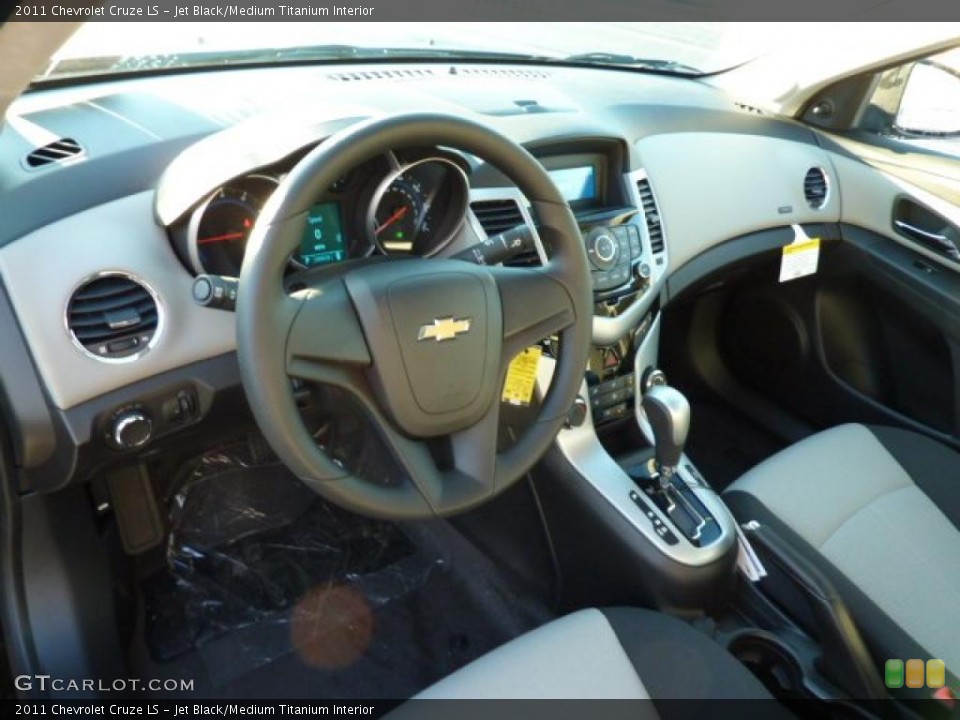 Jet Black/Medium Titanium Interior Dashboard for the 2011 Chevrolet Cruze LS #38065516
