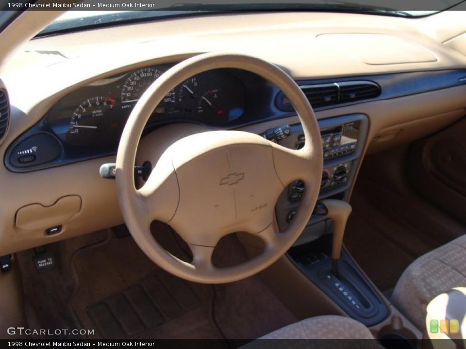 Medium Oak Interior Photo for the 1998 Chevrolet Malibu Sedan #38074158