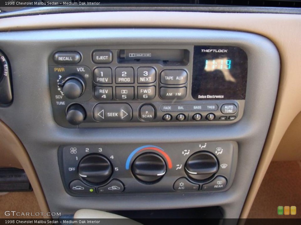 Medium Oak Interior Controls for the 1998 Chevrolet Malibu Sedan #38074166
