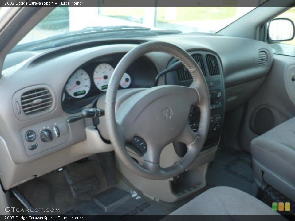 Taupe Interior Dashboard for the 2003 Dodge Caravan Sport #38085659