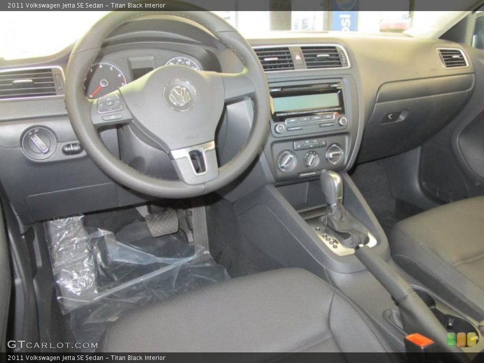Titan Black Interior Dashboard for the 2011 Volkswagen Jetta SE Sedan #38092689