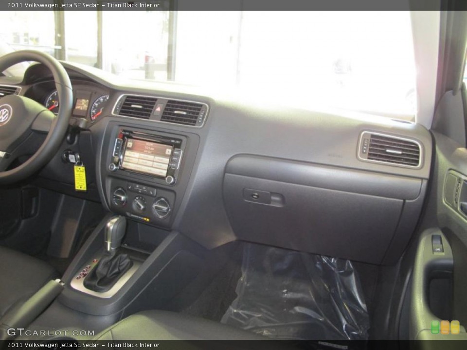 Titan Black Interior Dashboard for the 2011 Volkswagen Jetta SE Sedan #38092931