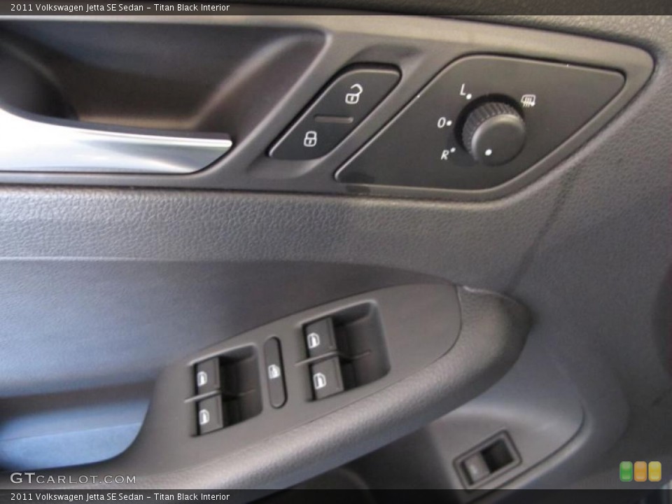 Titan Black Interior Controls for the 2011 Volkswagen Jetta SE Sedan #38092999