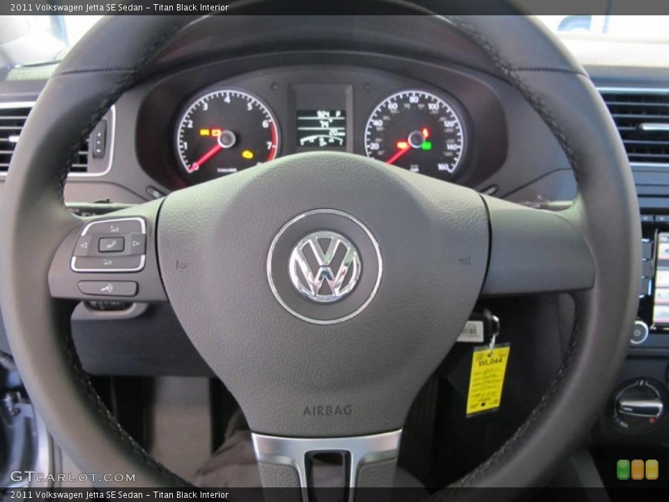 Titan Black Interior Steering Wheel for the 2011 Volkswagen Jetta SE Sedan #38093028