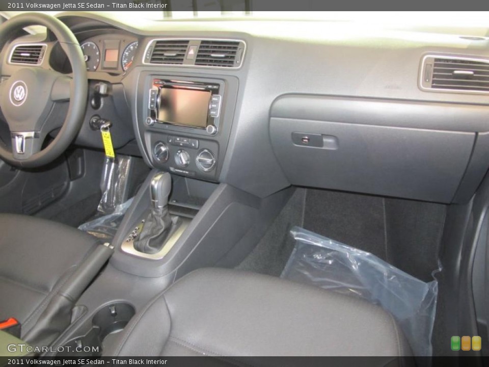 Titan Black Interior Dashboard for the 2011 Volkswagen Jetta SE Sedan #38093524