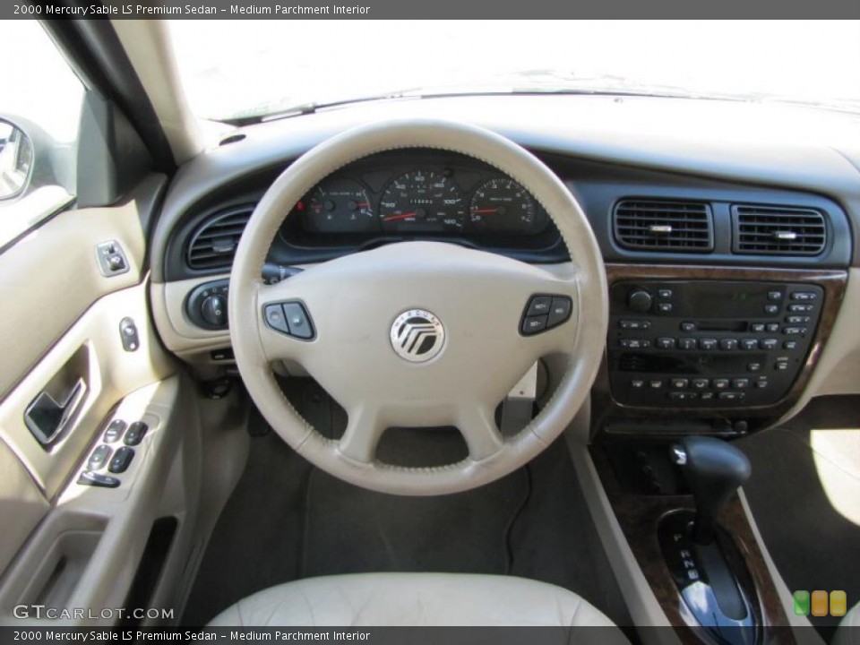 Medium Parchment Interior Steering Wheel for the 2000 Mercury Sable LS Premium Sedan #38100411