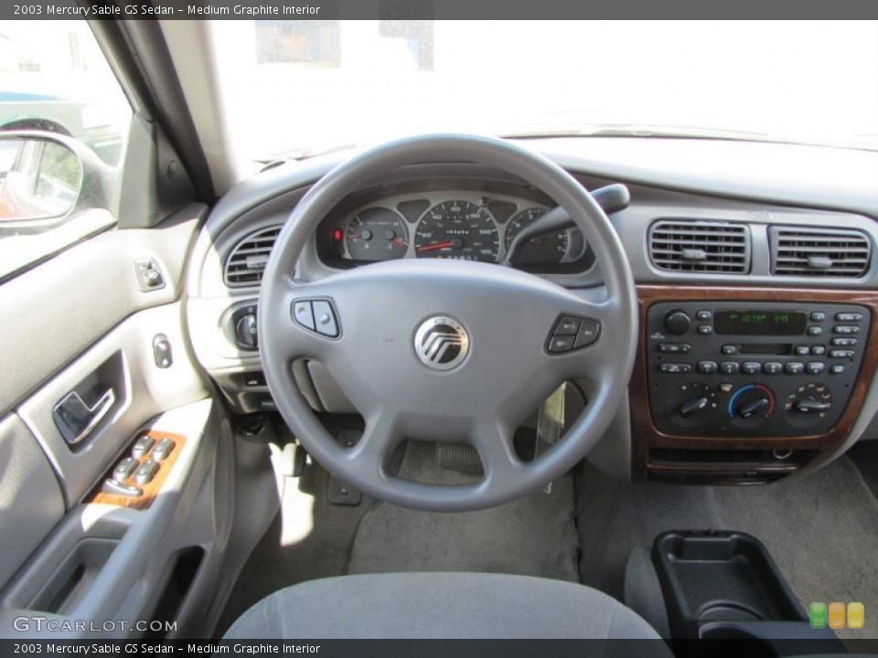 Medium Graphite Interior Dashboard for the 2003 Mercury Sable GS Sedan #38100631
