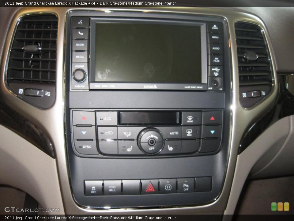 Dark Graystone/Medium Graystone Interior Controls for the 2011 Jeep Grand Cherokee Laredo X Package 4x4 #38115619
