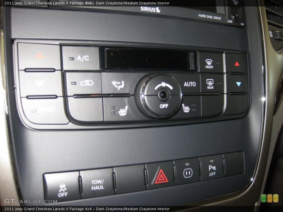 Dark Graystone/Medium Graystone Interior Controls for the 2011 Jeep Grand Cherokee Laredo X Package 4x4 #38115651