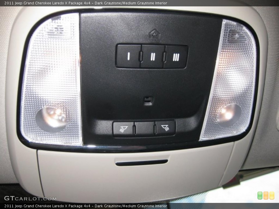 Dark Graystone/Medium Graystone Interior Controls for the 2011 Jeep Grand Cherokee Laredo X Package 4x4 #38115699