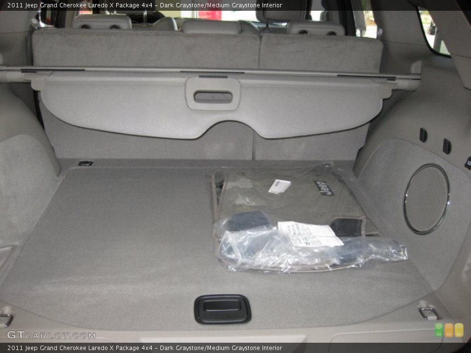 Dark Graystone/Medium Graystone Interior Trunk for the 2011 Jeep Grand Cherokee Laredo X Package 4x4 #38115803