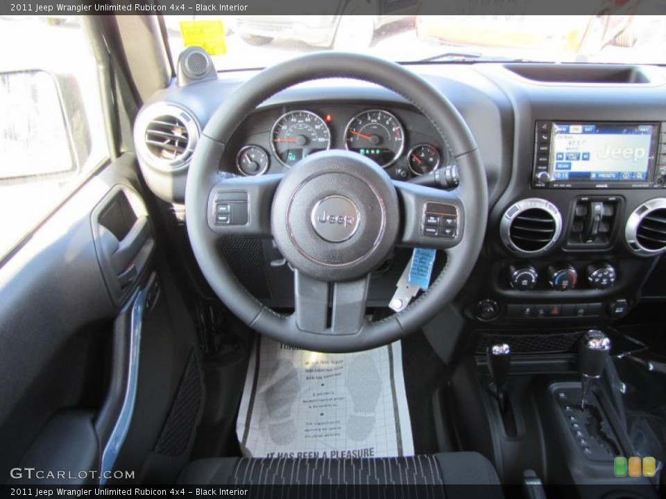 Black Interior Dashboard for the 2011 Jeep Wrangler Unlimited Rubicon 4x4 #38162749