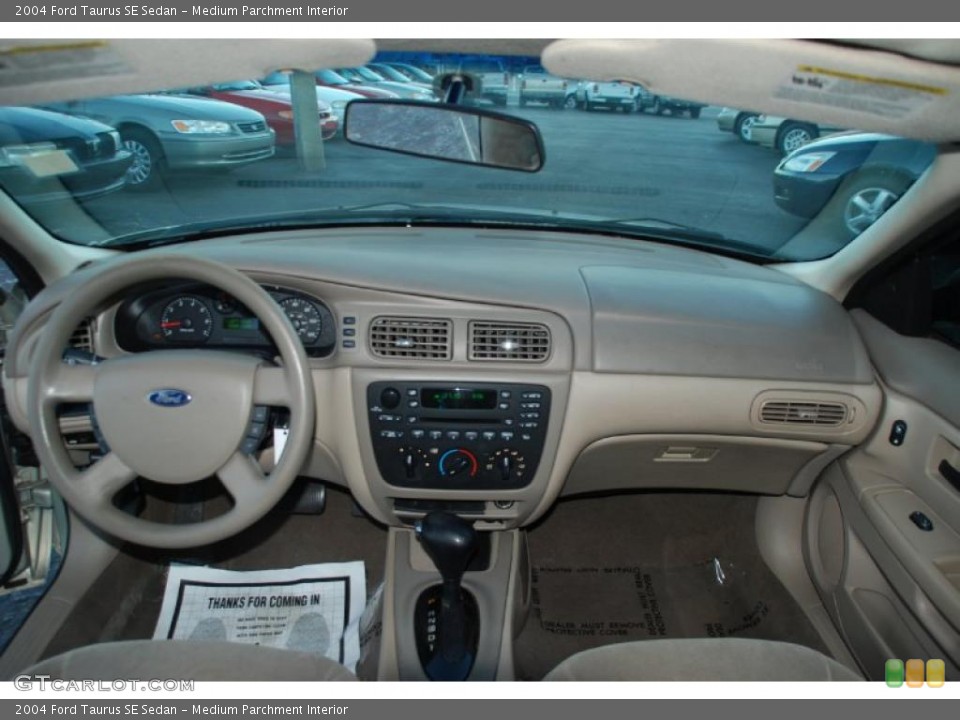 Medium Parchment Interior Dashboard for the 2004 Ford Taurus SE Sedan #38174964