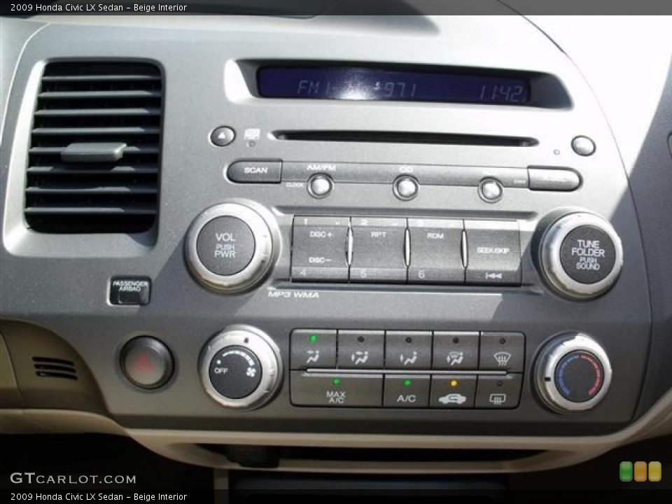 Beige Interior Controls for the 2009 Honda Civic LX Sedan #38185868