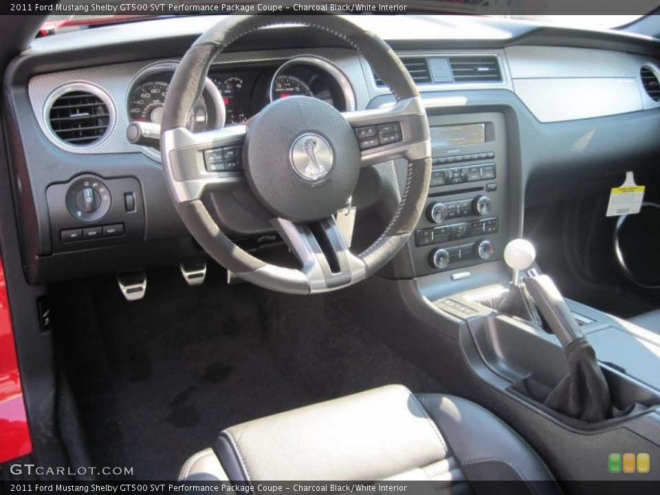 Charcoal Black/White Interior Photo for the 2011 Ford Mustang Shelby GT500 SVT Performance Package Coupe #38209312