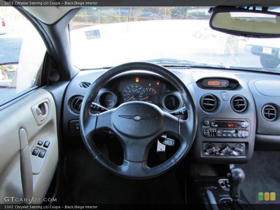 Black/Beige Interior Steering Wheel for the 2002 Chrysler Sebring LXi Coupe #38211464