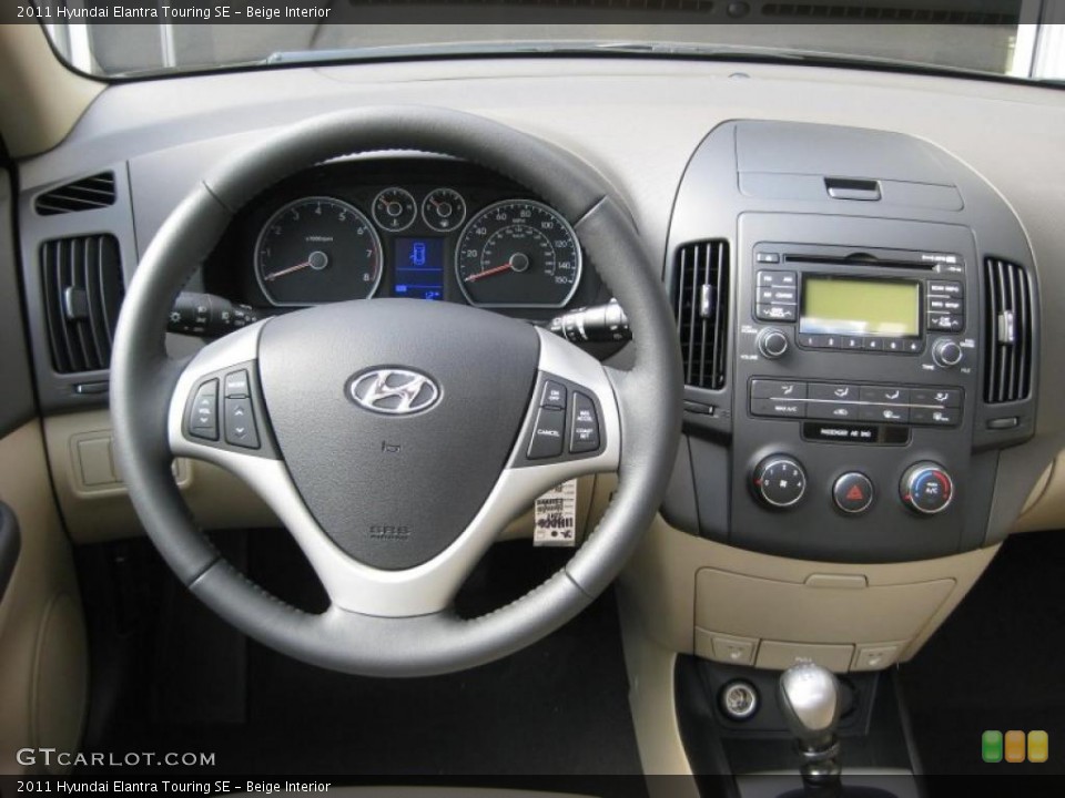 Beige Interior Dashboard for the 2011 Hyundai Elantra Touring SE #38213800