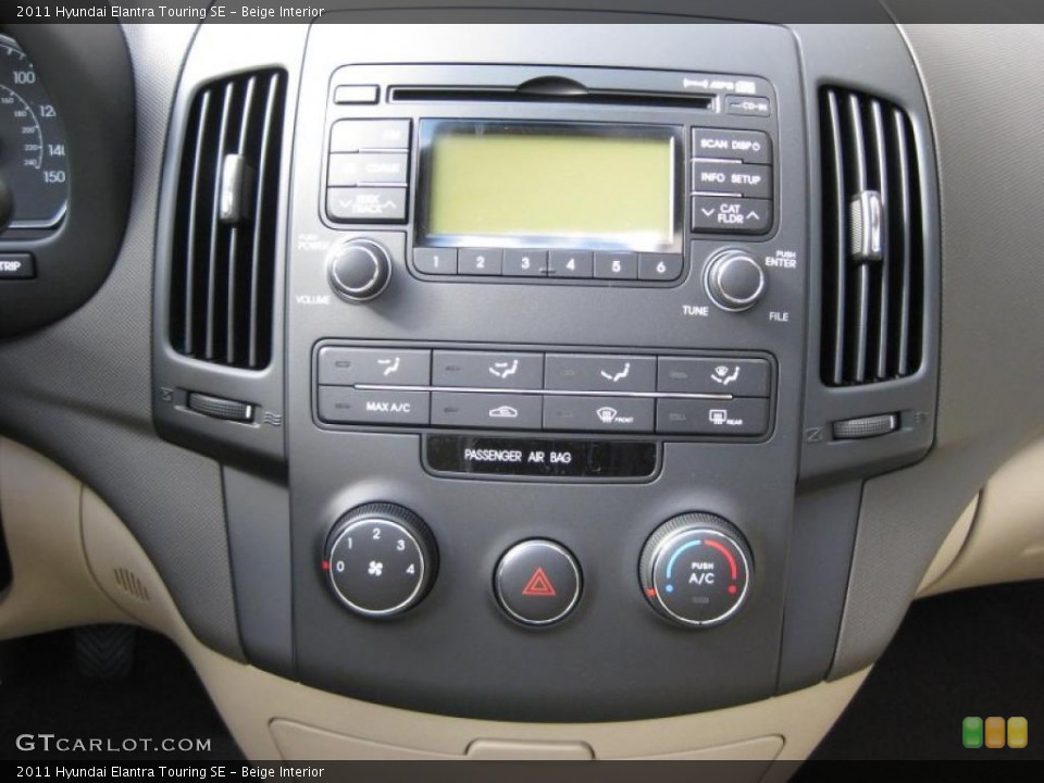 Beige Interior Controls for the 2011 Hyundai Elantra Touring SE #38213812