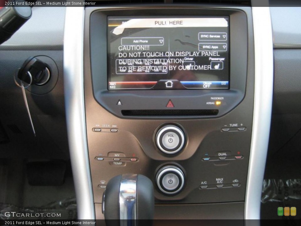 Medium Light Stone Interior Controls for the 2011 Ford Edge SEL #38217748