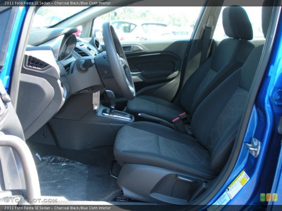 Charcoal Black/Blue Cloth Interior Photo for the 2011 Ford Fiesta SE Sedan #38222673