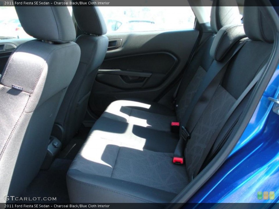 Charcoal Black/Blue Cloth Interior Photo for the 2011 Ford Fiesta SE Sedan #38222689