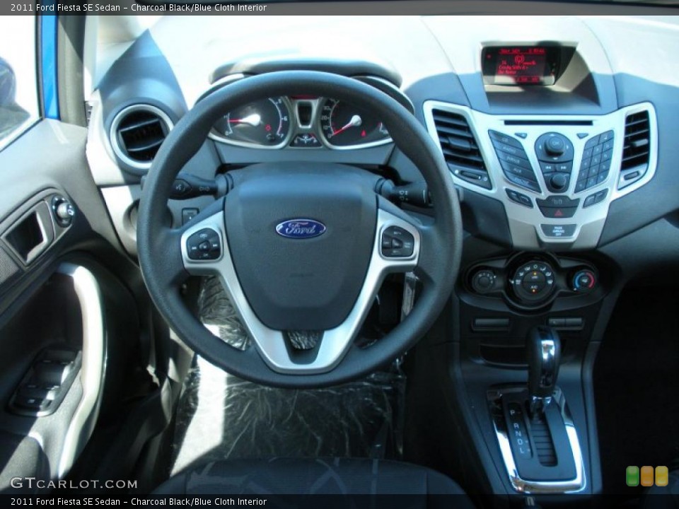 Charcoal Black/Blue Cloth Interior Dashboard for the 2011 Ford Fiesta SE Sedan #38222701