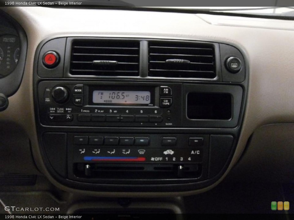 Beige Interior Controls for the 1998 Honda Civic LX Sedan #38223069