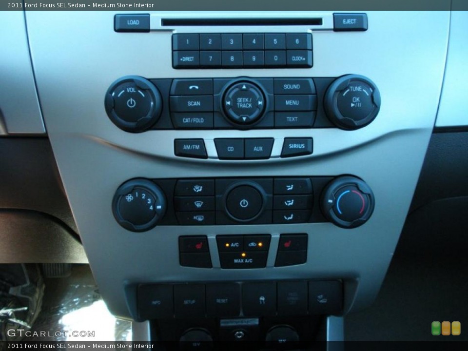 Medium Stone Interior Controls for the 2011 Ford Focus SEL Sedan #38224001