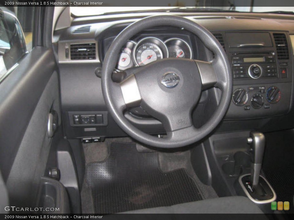 Charcoal Interior Steering Wheel for the 2009 Nissan Versa 1.8 S Hatchback #38272040