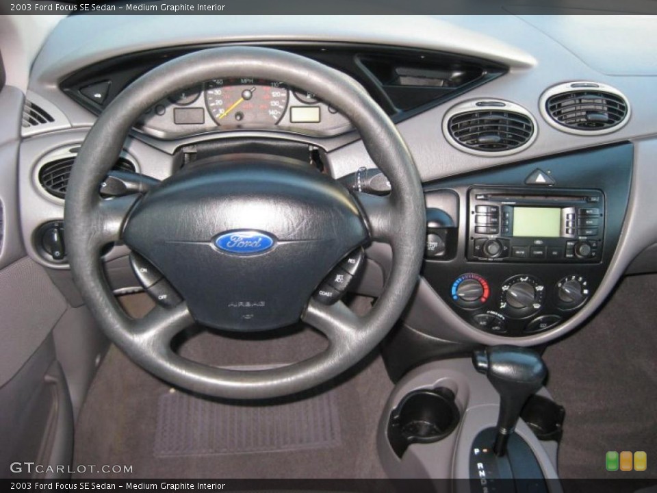 Medium Graphite Interior Dashboard for the 2003 Ford Focus SE Sedan #38283344