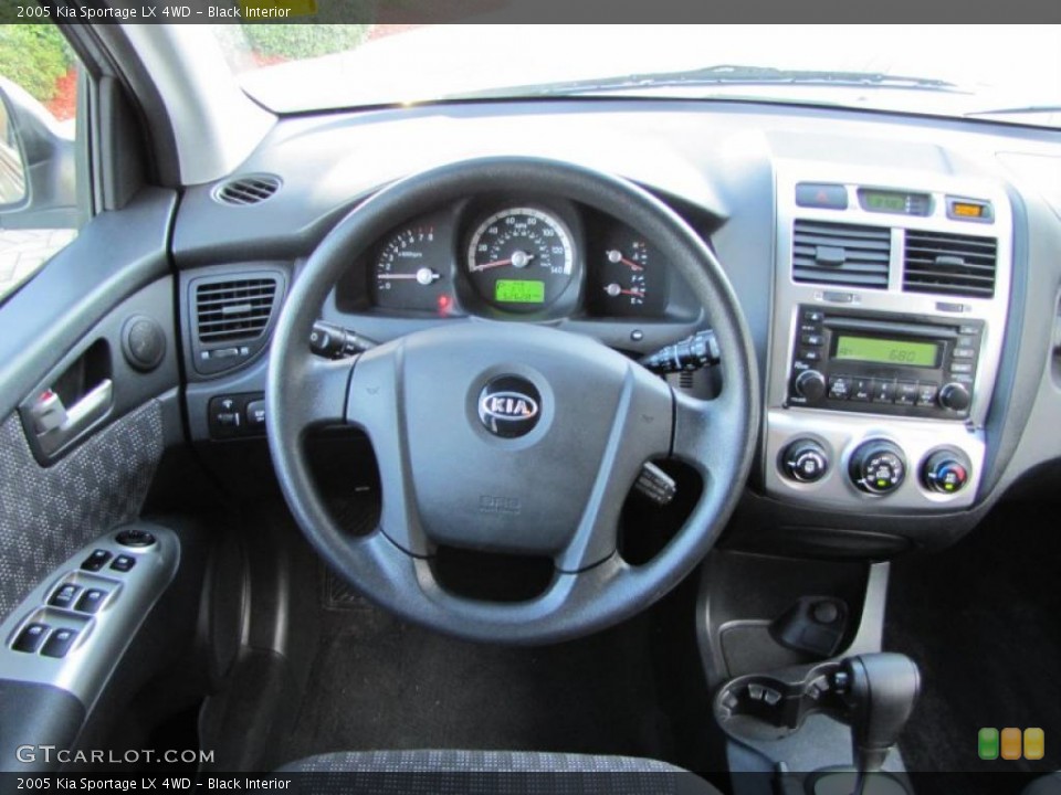 Black Interior Steering Wheel for the 2005 Kia Sportage LX 4WD #38320387