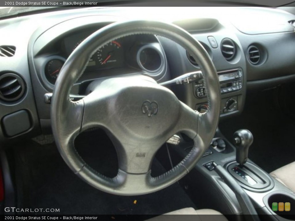Black/Beige Interior Steering Wheel for the 2001 Dodge Stratus SE Coupe #38333431