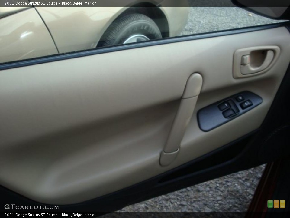 Black/Beige Interior Photo for the 2001 Dodge Stratus SE Coupe #38333459