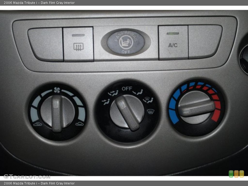 Dark Flint Gray Interior Controls for the 2006 Mazda Tribute i #38348378