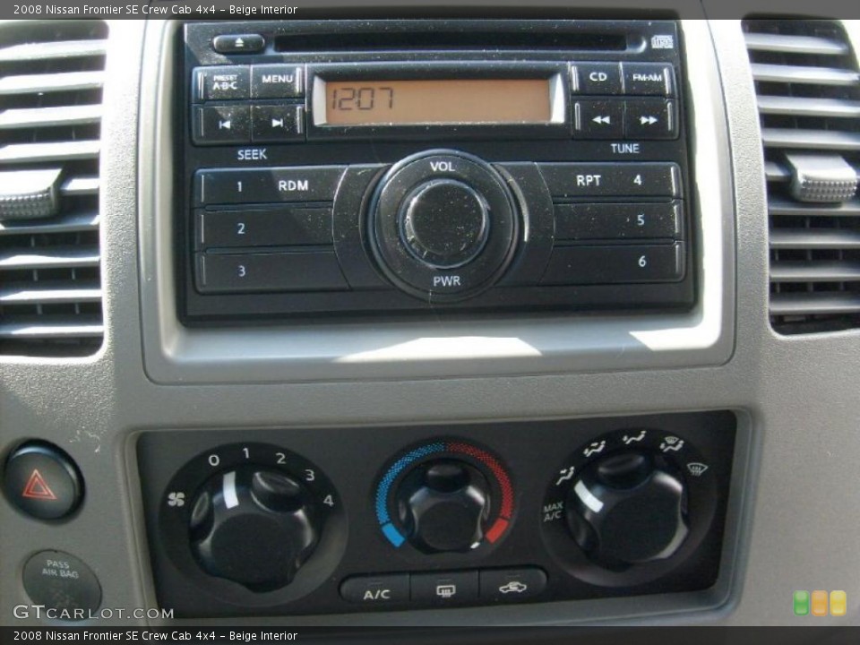 Beige Interior Controls for the 2008 Nissan Frontier SE Crew Cab 4x4 #38354338