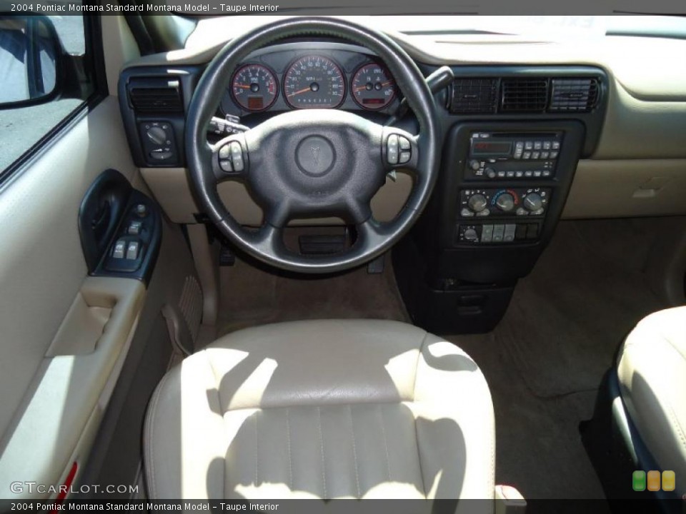 Taupe Interior Dashboard for the 2004 Pontiac Montana  #38359730