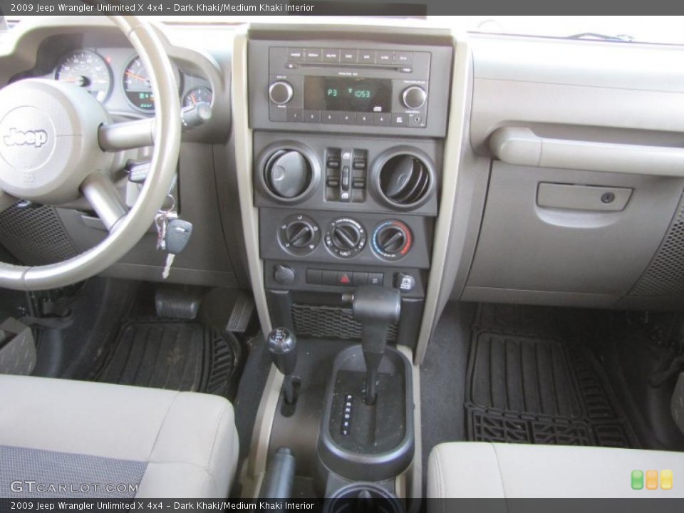 Dark Khaki/Medium Khaki Interior Dashboard for the 2009 Jeep Wrangler Unlimited X 4x4 #38376482