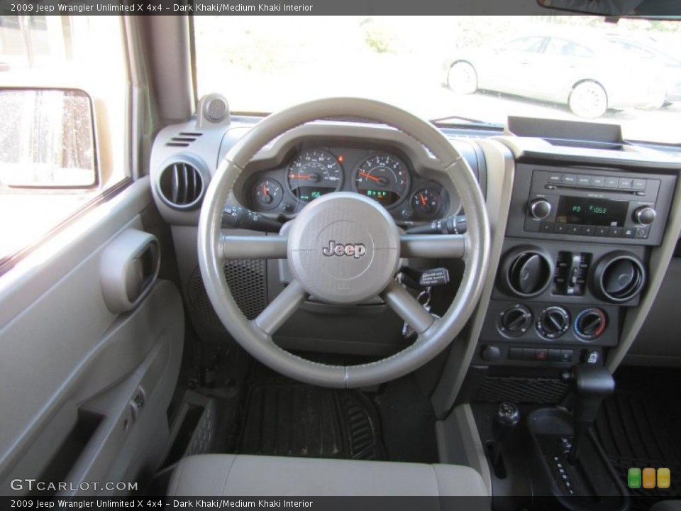 Dark Khaki/Medium Khaki Interior Dashboard for the 2009 Jeep Wrangler Unlimited X 4x4 #38376506