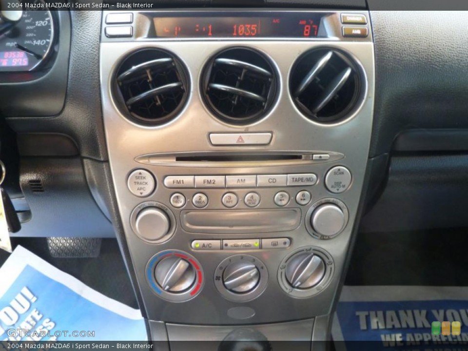 Black Interior Controls for the 2004 Mazda MAZDA6 i Sport Sedan #38392912
