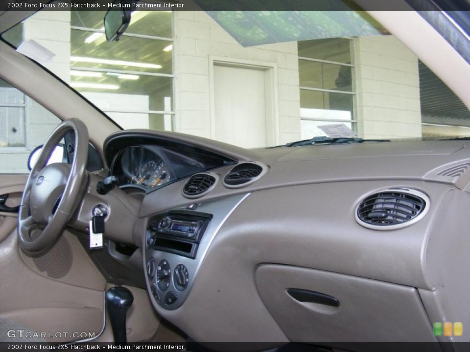 Medium Parchment Interior Dashboard for the 2002 Ford Focus ZX5 Hatchback #38403156