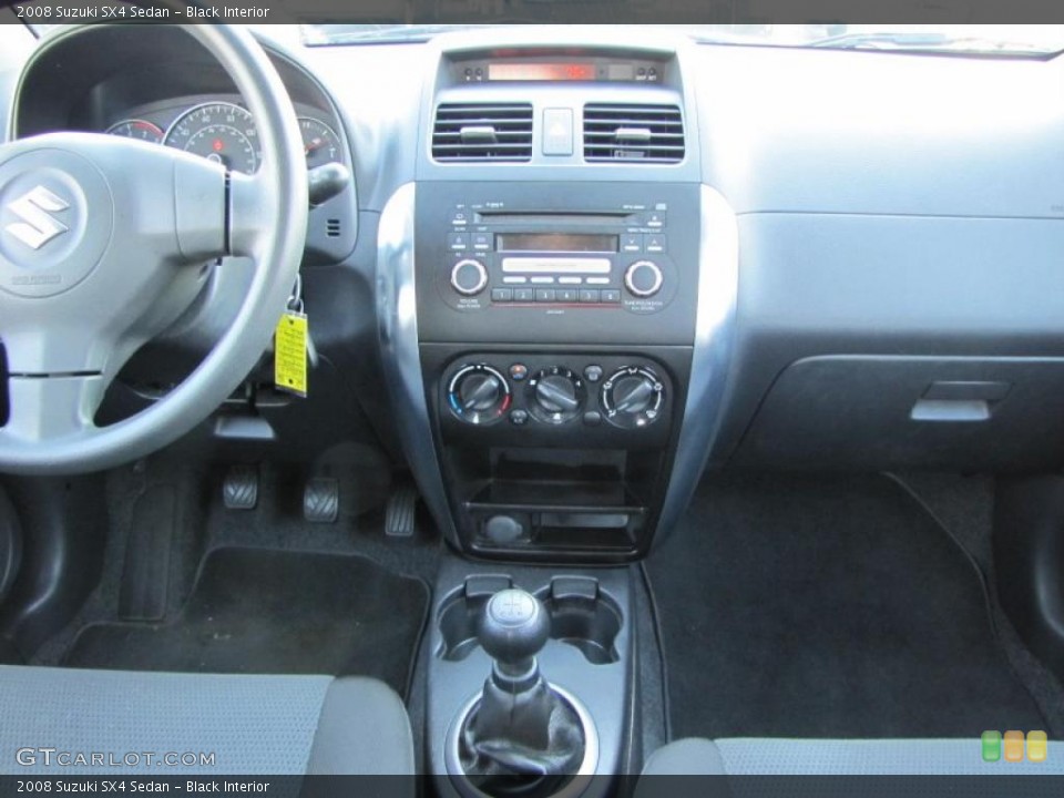 Black Interior Dashboard for the 2008 Suzuki SX4 Sedan #38405194