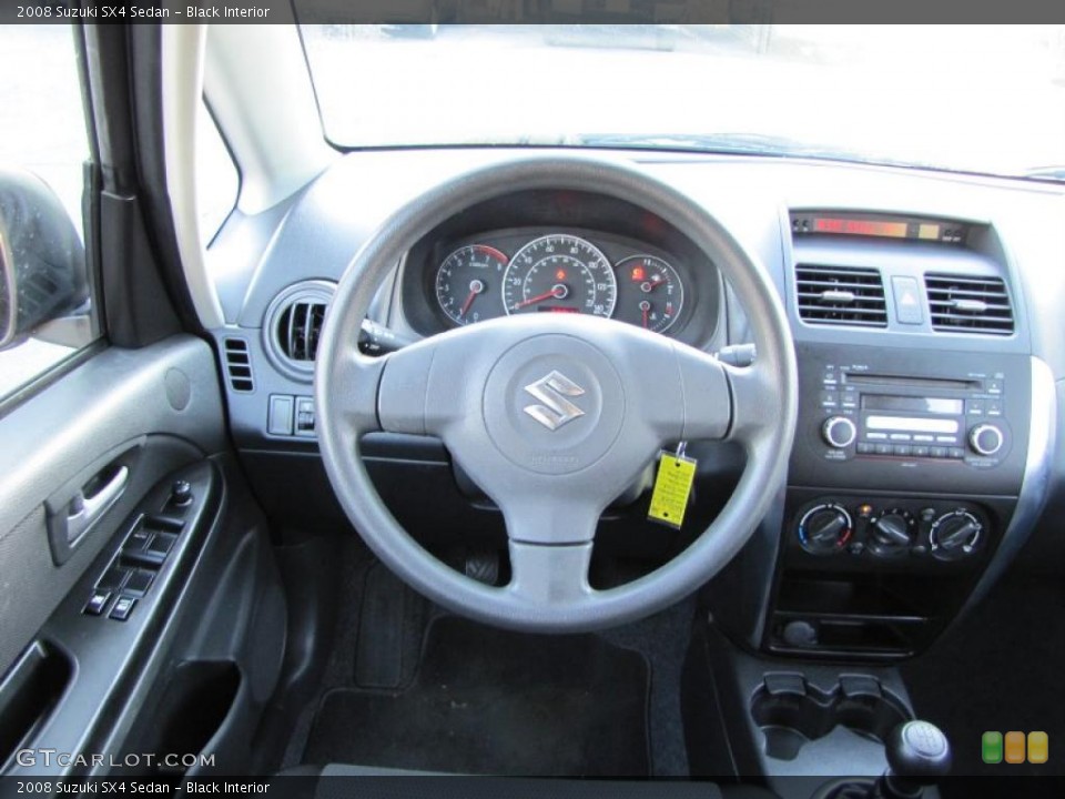 Black Interior Dashboard for the 2008 Suzuki SX4 Sedan #38405214