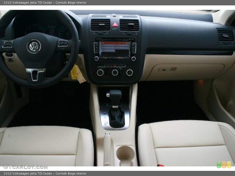 Cornsilk Beige Interior Dashboard for the 2010 Volkswagen Jetta TDI Sedan #38409016