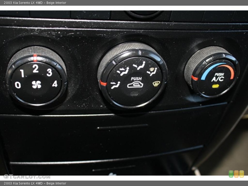 Beige Interior Controls for the 2003 Kia Sorento LX 4WD #38424673