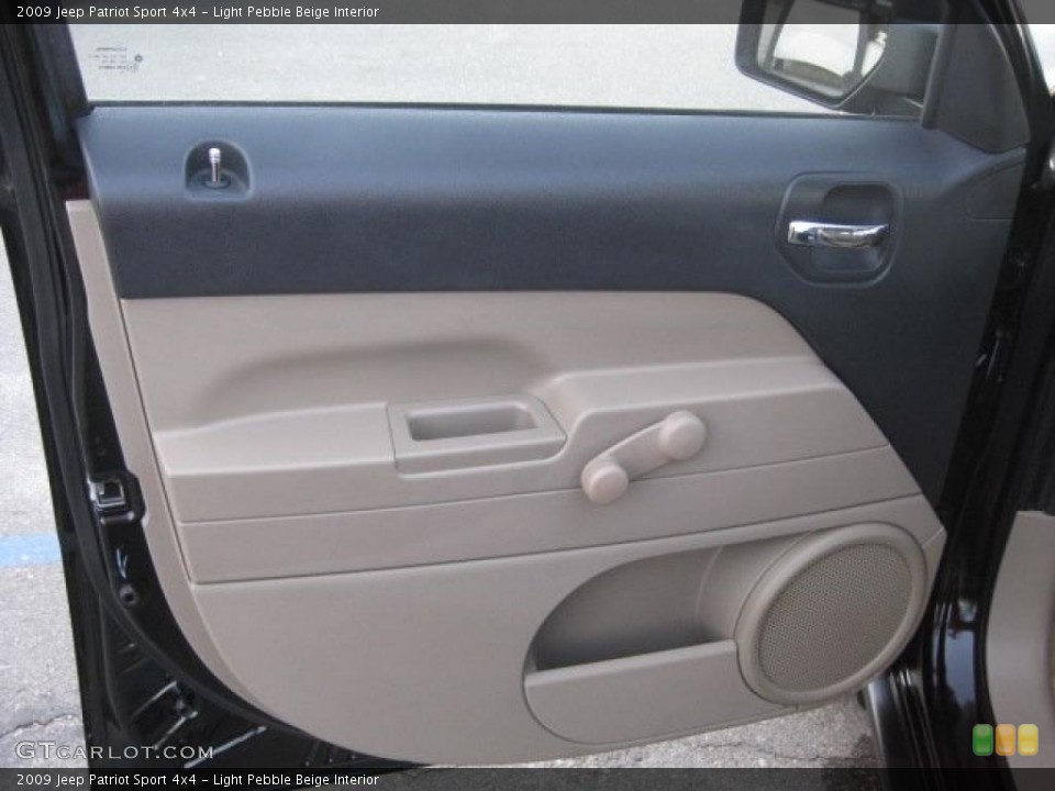 Light Pebble Beige Interior Door Panel for the 2009 Jeep Patriot Sport 4x4 #38430033