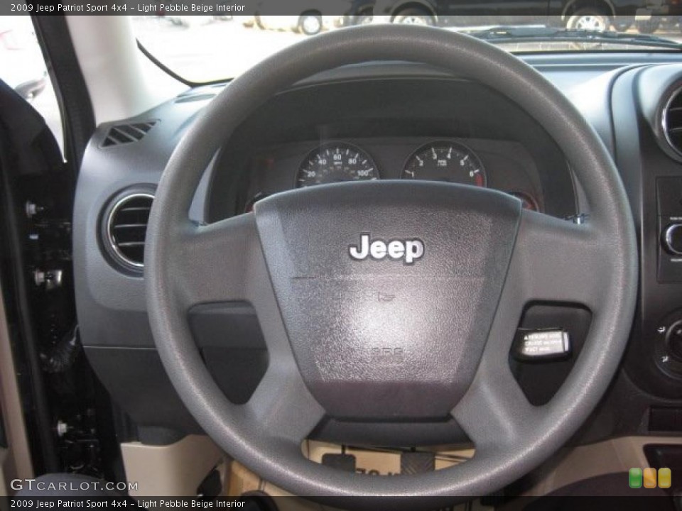 Light Pebble Beige Interior Steering Wheel for the 2009 Jeep Patriot Sport 4x4 #38430065