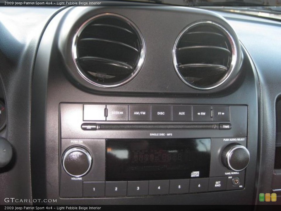 Light Pebble Beige Interior Controls for the 2009 Jeep Patriot Sport 4x4 #38430097