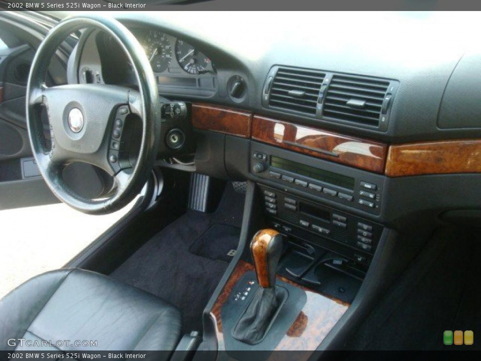 Black Interior Dashboard for the 2002 BMW 5 Series 525i Wagon #38441496