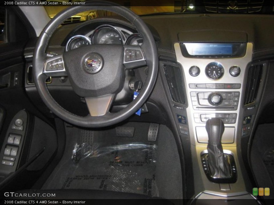 Ebony Interior Dashboard for the 2008 Cadillac CTS 4 AWD Sedan #38441788