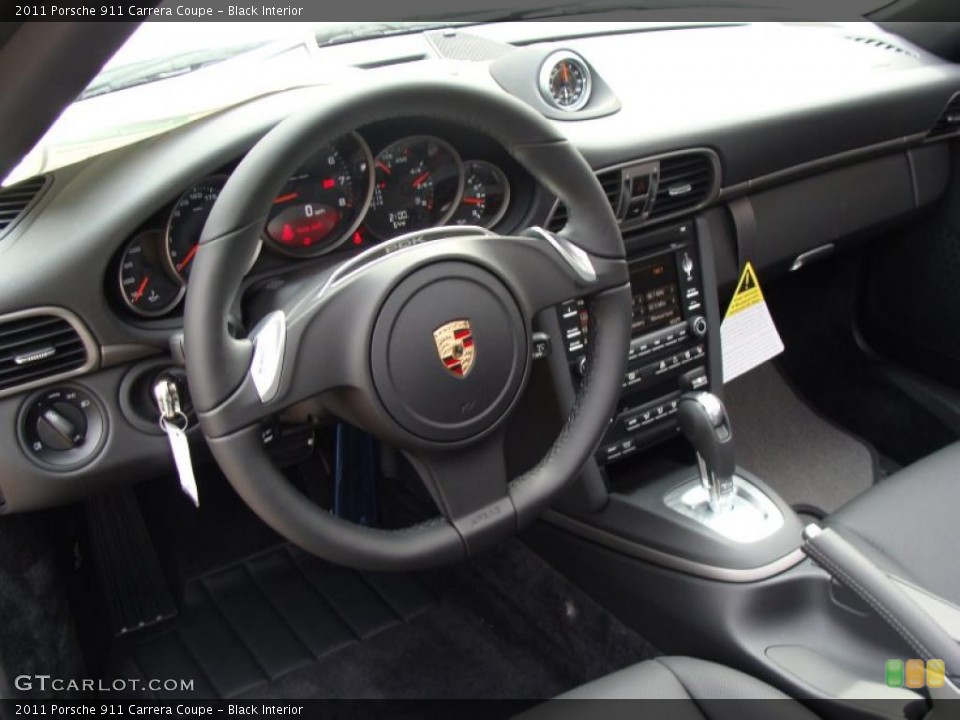 Black Interior Prime Interior for the 2011 Porsche 911 Carrera Coupe #38446844